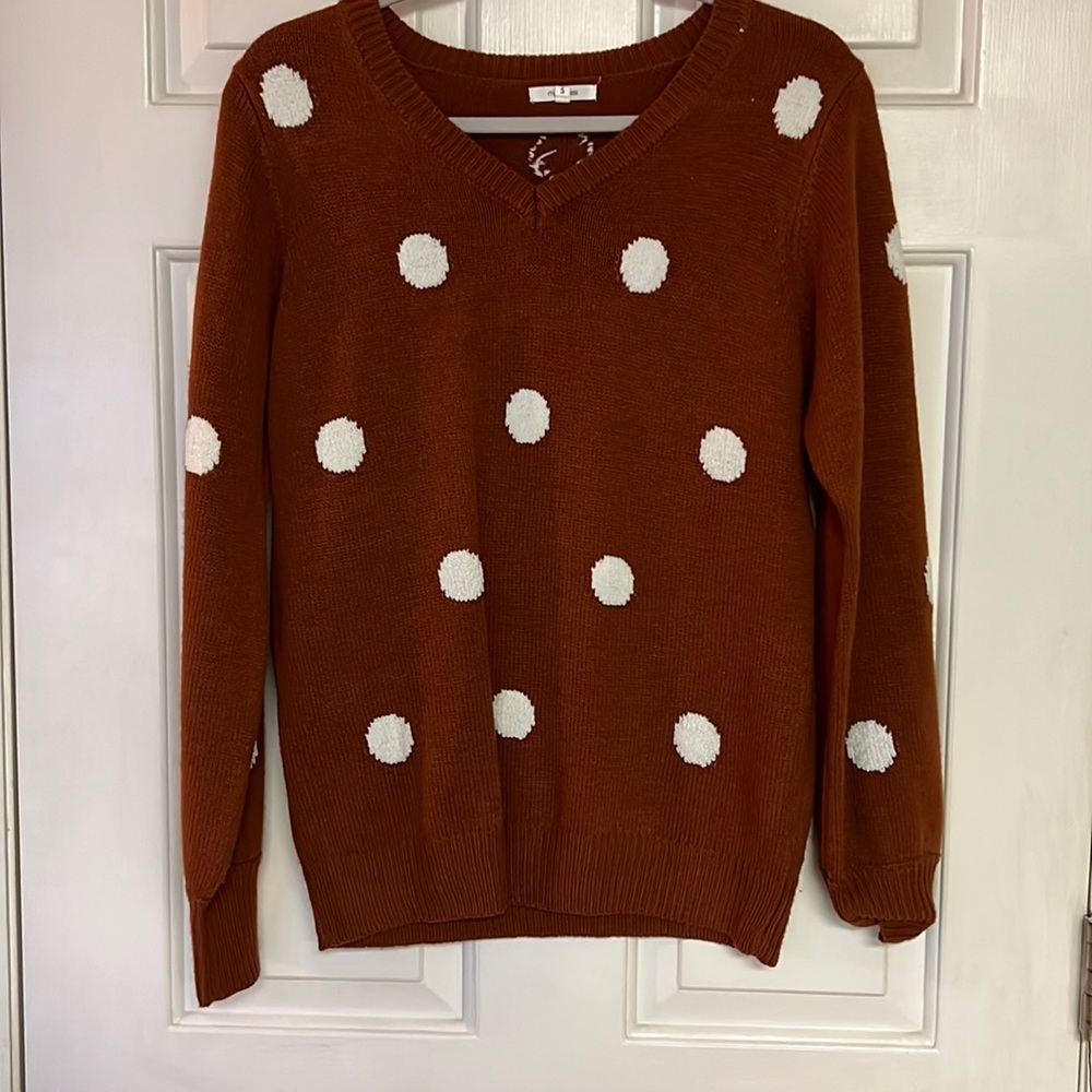 Maurice’s. Tan/Auburn color